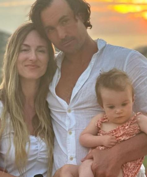 Justin Qualley with his wife Nicolette and daughter